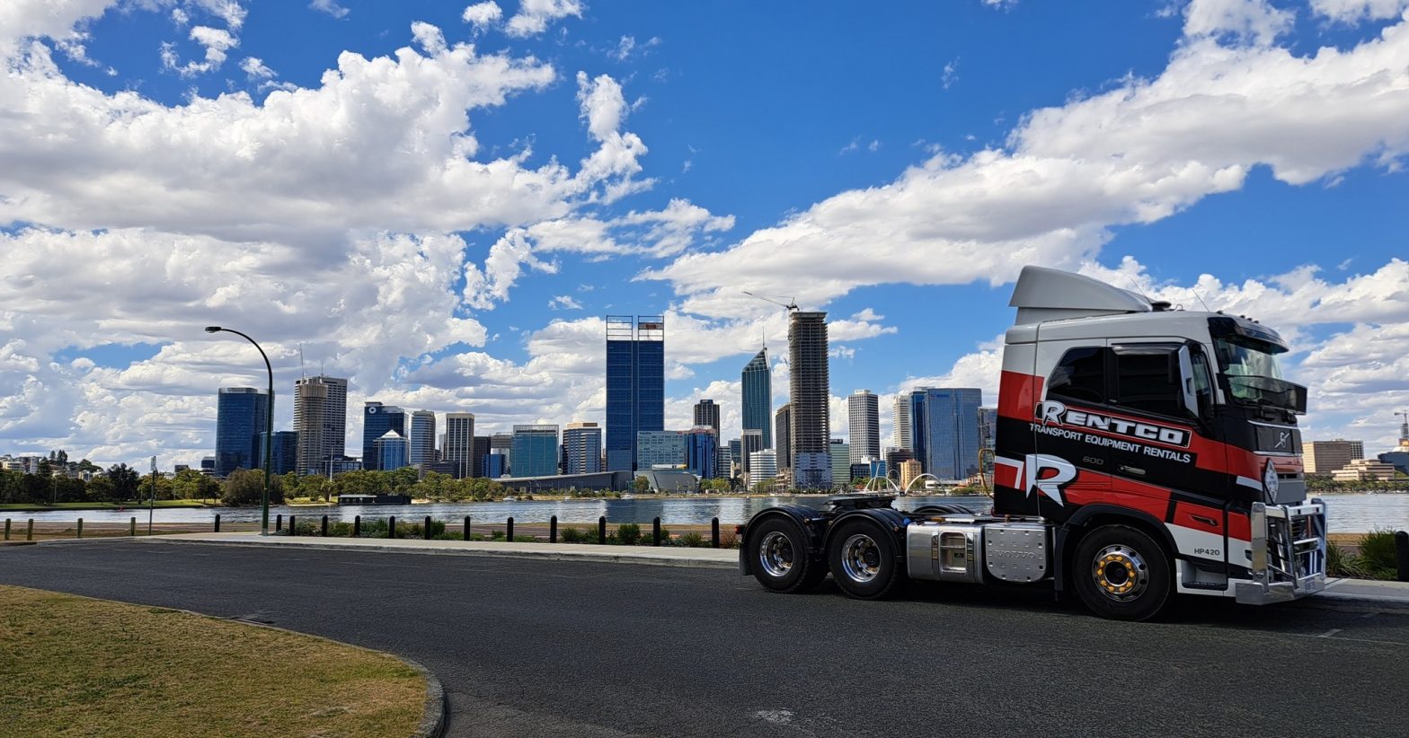 Rentco Truck driving on the road in Perth city.